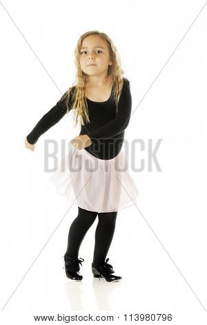 A cute kindergartner tap dancing with a twist and a tap.  On a white background.