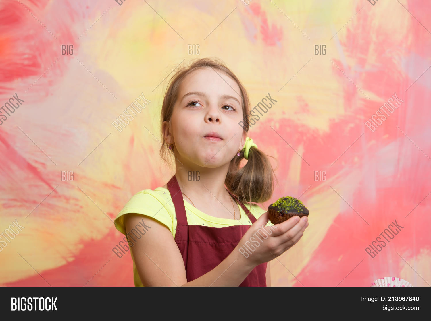 girl eating cupcake image
