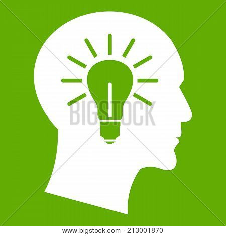 Light bulb inside head icon white isolated on green background. Vector illustration