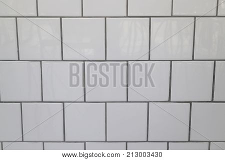 White tiles wall in modern kitchen stock photo