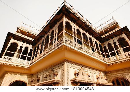 Balcony of Mubarak Mahal in Jaipur City Palace Rajasthan India. Maharaja Residence. Old Indian architecture with carving and ornament. Wide angle