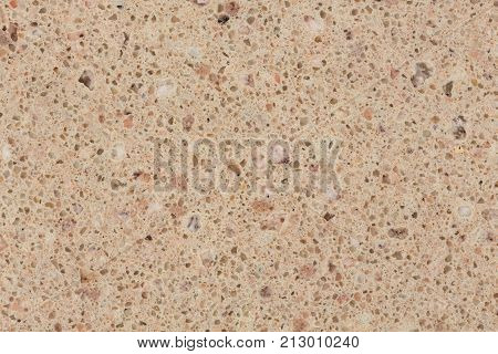 Close up of beige artificial rock textture. High resolution photo.