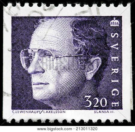 LUGA RUSSIA - OCTOBER 6 2017: A stamp printed by SWEDEN shows image portrait of Carl XVI Gustaf King of Sweden circa 1994