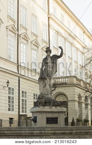 Old fountain with statue goddess of sea Amphitrite 18th century stands on market square of city Lvov, Ukraine