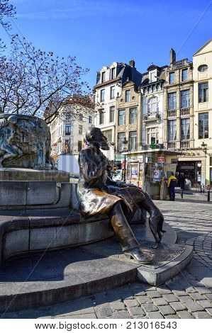 Brussels Belgium - April 2015: Bronze statue of Charles Buls or Karel Buls a Belgian politician and mayor of the City of Brussels during 1881-1899 located at Grass Market Agora Square near Grand Place in Brussels Belgium