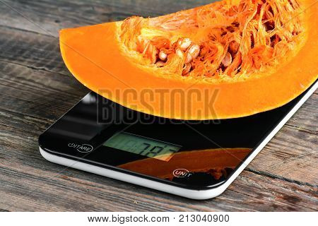 Cut Pumpkin On The Scales