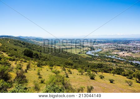 View of the mountains river and city of Talca Chile