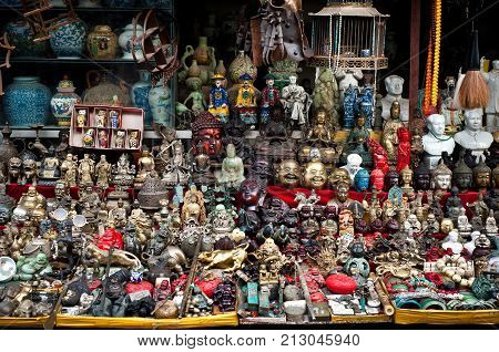SHANGHAI, CHINA - DEC 30, 2012 - Souvenir stall at Dongtai Road Antique Market, Shanghai