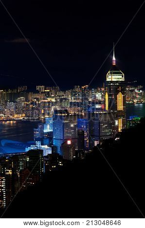 WANCHAI HONG KONG - MAY 31 2013 - Central Plaza skyscraper illuminated at night as seen from Stubbs Road Hong Kong Island