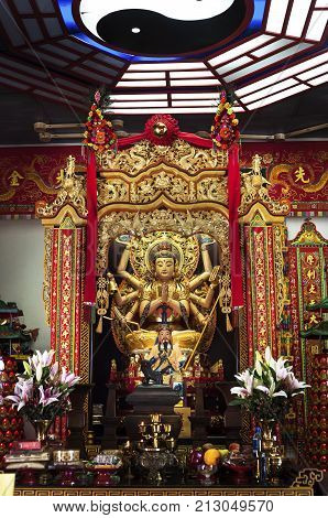 SHATIN, HONG KONG - SEPT 15, 2013 - Golden statue of a Taoist deity at Che Kung Temple, Shatin