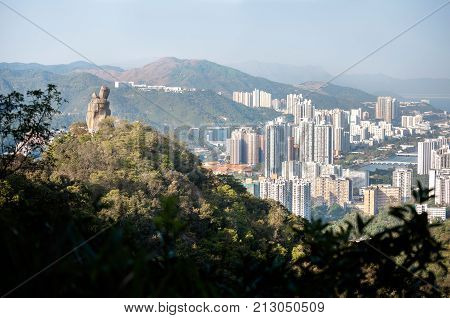 LION ROCK COUNTRY PARK HONG KONG - FEB 2 2012 - Amah Rock with Shatin new town in the background at Lion Rock Country Park Hong Kong