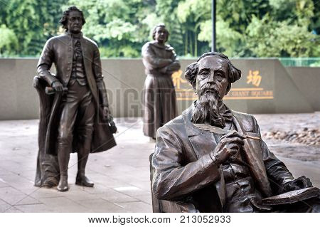 SHANGHAI, CHINA - SEPT 9, 2015 - Statue of Charles Dickens at the World Literary Giant Square, Lu Xun Park, Shanghai