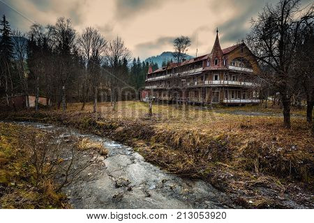 ZDIAR, SLOVAKIA - OCTOBER 18, 2017 : Abandoned and ruined hotel in the village of Zdiar situated in the Belianske Tatra Mountains which is a part of High Tatras.