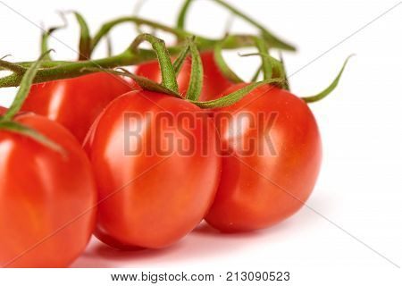 Ripe Fresh Cherry Tomatoes On Branch, Isolated On White Background