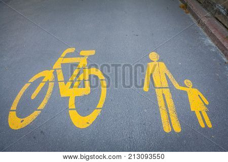 Bicycle Signs Painted On Asphalt