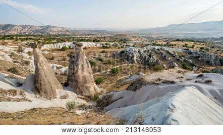 Goreme village Turkey - August 2017: . Rural Cappadocia landscape. Stone houses of Cappadocia. Sunny Goreme. Countryside lifestyle of Cappadocia Turkey