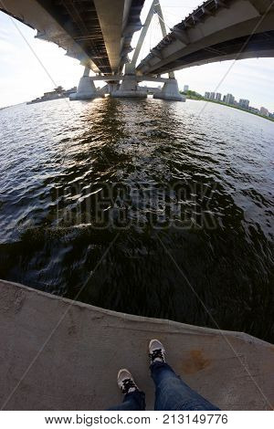 Legs On The Bridge Edge