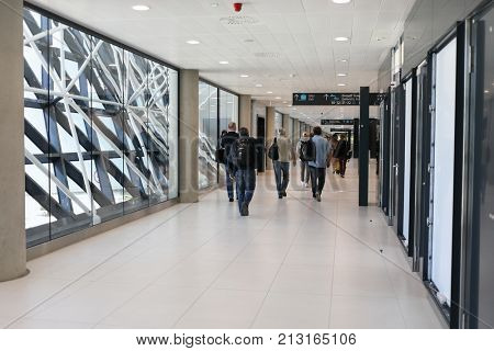 ZAGREB, CROATIA - MAY 19, 2017: Walking people at the new airport in Zagreb