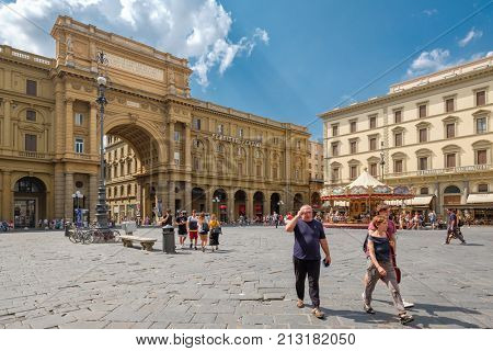 FLORENCE,ITALY - JULY 22,2017 : Tourists and locals at  Piazza della Repubblica in Florence