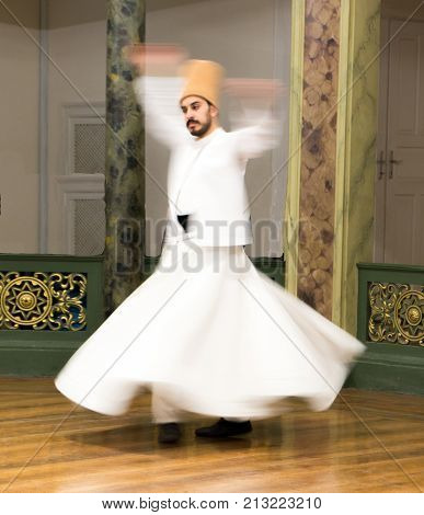 Blurred Whirling Dervishes Practice Their Dance