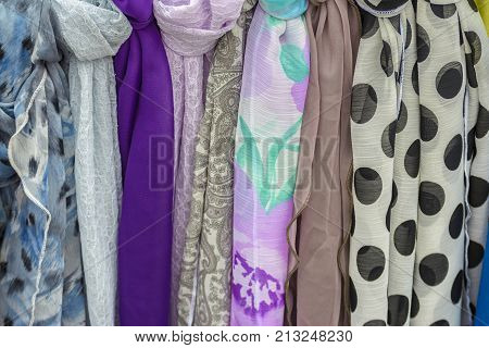 Handmade scarves exposed for sale in an indian store.