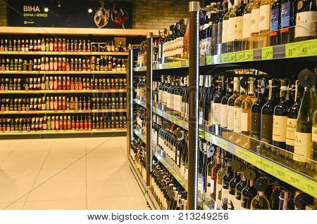 The wine section of the shop Euroopt shopping centre Gallery the city of Minsk February 2017. Shallow depth of field.