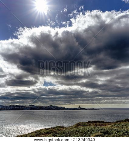 Bay Of La Coruna Seen From The Top Of A Cliff Of The Galician Atlantic Coast In Spain. With The City