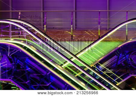 Colorful Escalators Lit By Neons In A Mall In Moscow, Russia