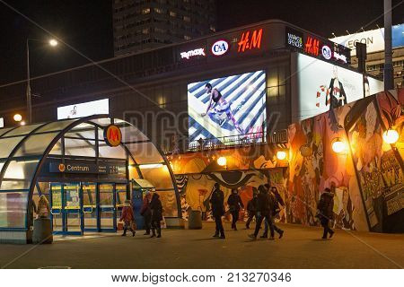 WARSAW, POLAND - JANUARY 02, 2016: Entrance to the metro station Centrum at winter night. Centrum is a station on Line M1 of the Warsaw Metro located under Plac Defilad a square in downtown.