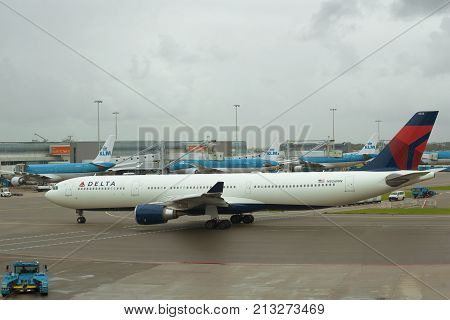 AMSTERDAM, NETHERLANDS - SEPTEMBER 30, 2017: Aircraft Airbus A330-302 (N826NW) Delta Air Lines on the Schiphol airport gloomy September day