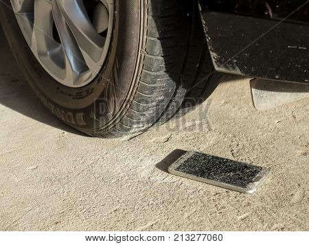 Chiangrai Thailand: October 04 2017 - Old cracked screen Samsung Galaxy S6 broken by car wheel