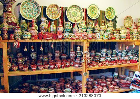 Kosiv town Ivano-Frankivsk region/ Ukraine. 26 October 2017: diversity of souvenirs made by Kosiv potters on the shelves. 26 October 2017 Kosiv town Ivano-Frankivsk region / Ukraine.
