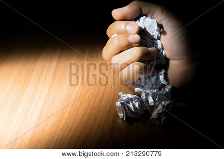 hand crush the paper in concept every success begin from failure
