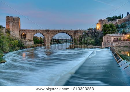 The Puente de San Martin in Toledo, Spain, at dawn