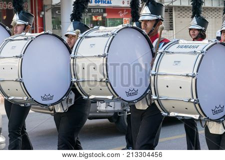 Hatyai Songkhla Thailand - September 12 2017 : Drummers Playing Bass Drum in the Mother's Day Parade
