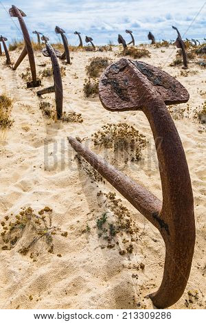 Natural Cemetery Of Marine Anchors At Barril Beach, Portugal