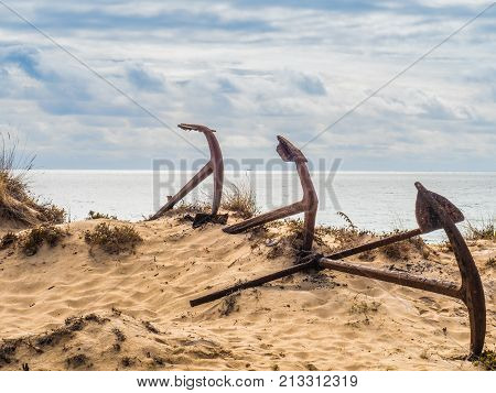 Natural Cemetery Of Marine Anchors At Barril Beach, Portugal