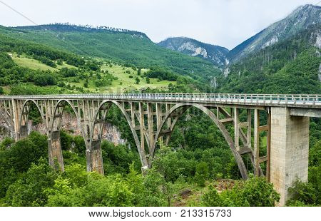 Mountain landscape, Montenegro. Durdevica Tara arc bridge in the mountains