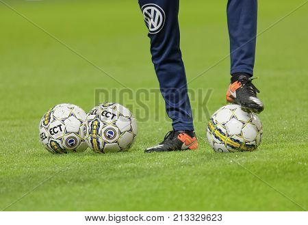 SOLNA SWEDEN - OCT 30 2017: Closeup of balls feet and legs of soccer player in the game AIK and IFK Gothenburg. October 30 2017SolnaSweden