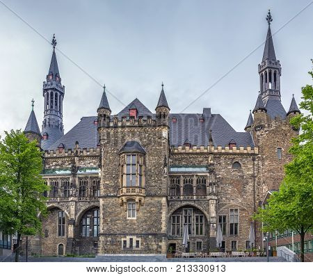 The Gothic Aachen Rathaus or Aachen City Hall lies next to the Aachen Cathedral and is one of the most striking structures in the Altstadt of Aachen Germany.