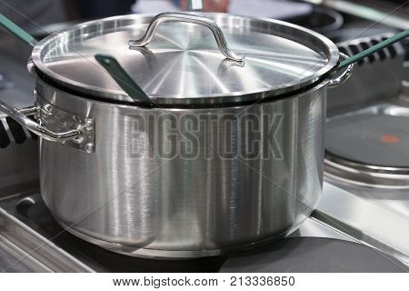 Metal stainless steel pan on a kitchen stove