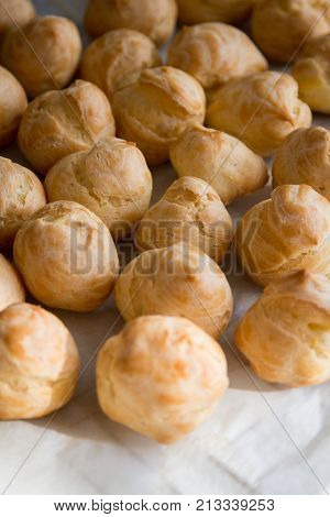 Homemade cookery and bakery. Top view of apetizing profiteroles.