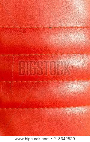 background of red leather . Photo of an abstract texture