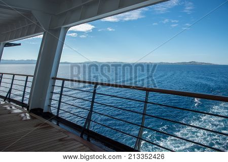 NADI, FIJI, PACIFIC ISLANDS-NOVEMBER 27TH, 2016: View into island landscape with Pacific Ocean waters from cruise ship balcony in Nadi, Fiji, Pacific Islands