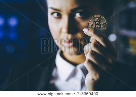 coin bitcoin cryptocurrency hold hand blured female