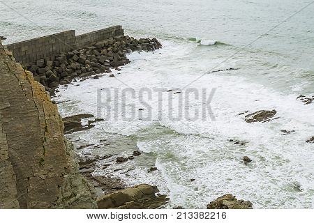 A top view on the beach of Getxo of the Atlantic ocean in Bilbao on the North of Spain.