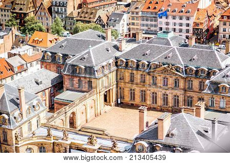 Aerial cityscape view on the old town with courtyard of Rohan palace in Strasbourg city in France