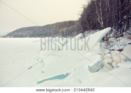 scenic winter landscape. view ice chunks with snow