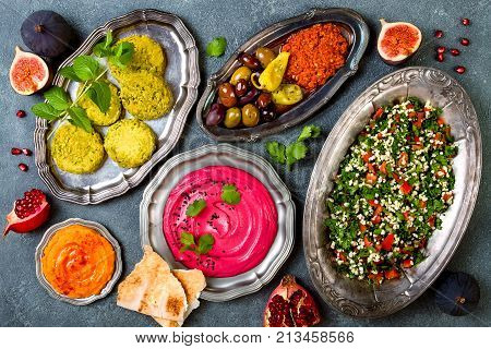 Middle Eastern traditional dinner. Authentic arab cuisine. Meze party food. Top view flat lay overhead