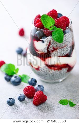 Homemade Healthy Chia Pudding, Berries, Raspberries, Blueberries, Mint, Almond Milk In A Glass. Copy